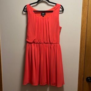 Coral mini summer sleeveless dress with pleating